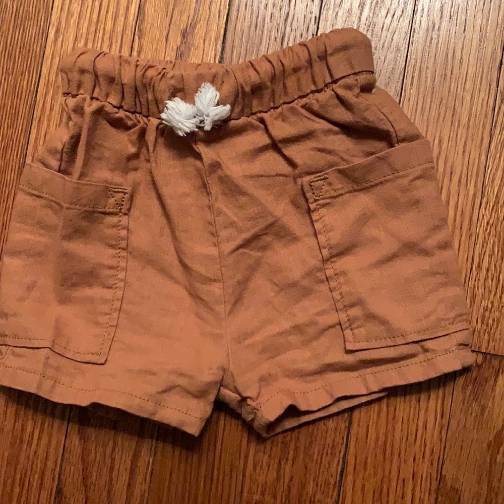 Never worn size NB shorts!